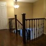 hardwood-installation-custom-make-nosing-metal-spindles-solid-oak-newel-post-curved-nosing-installation-in-aurora