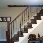 straight-stairs-capping-metal-spindles-installed-in-king-city