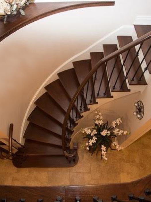 circular-stair-case-custom-make-nosing-hardwood-installtion-metal-spindles-wood-posts-shelf-landing-white-stringers-curved-nosing-installation-in-mississauga