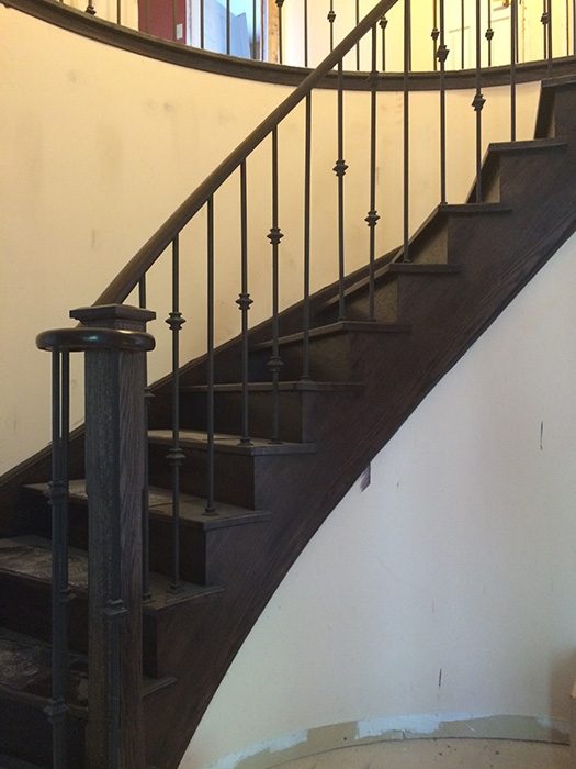 circular-stair-metal-spindles-reveneering-stringers-installation-in-keswick