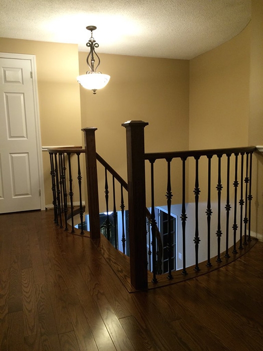 hardwood-installation-custom-make-nosing-metal-spindles-solid-oak-newel-post-curved-nosing-installation-in-aurora